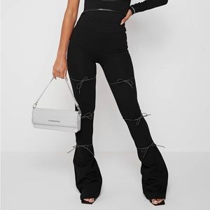 NWT Maniere de Voir Reflective Bungee Flared Leggings - Black.